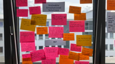 Window of post-its at an OSP workshop