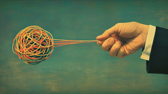 Unravelling a tangled ball of multicolored string as a metaphor for pulling together your Value Cases