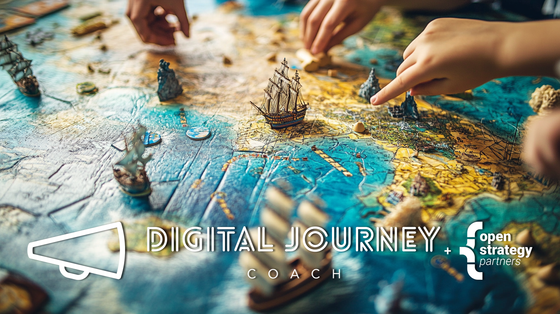 Board game board with maps and ships, Digital Journey Coach and Open Strategy Partners logos in foreground