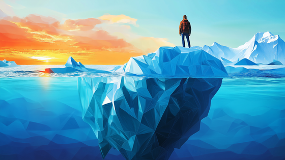 Human figure standing on the tip of an iceberg floating in the water. We see the mass of the iceberg below the water. 